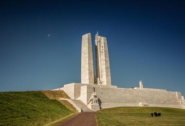 Monument to Canadian war dead situated on a hillside, honoring those who served in the military.