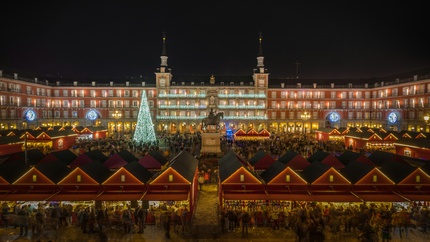 Plaza Mayor in Madrid, Spain, beautifully decorated for Christmas with lights and festive decorations.