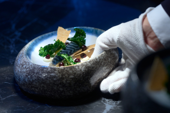 Bowl of food served by the waiter in Rost on board MS Trollfjord
