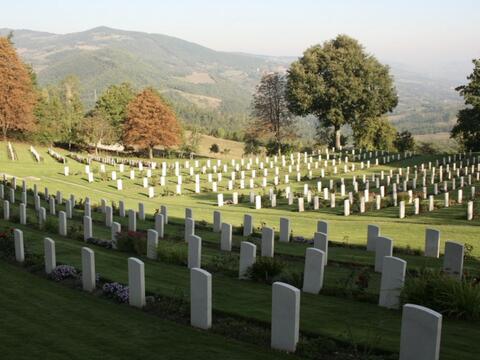 A serene view of graves at Foiano Della Chiana Commonwealth War Graves Cemetery, commemorating fallen soldiers.