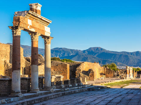 Ruins of Pompeii, Italy, showcasing ancient stone structures and remnants of a once-thriving Roman city.