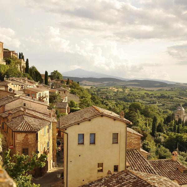 Aerial view of San Giovanni in Montepulciano, Italy, highlighting its picturesque town and surrounding vineyards.